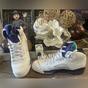 White, purple and turquoise Jordan’s